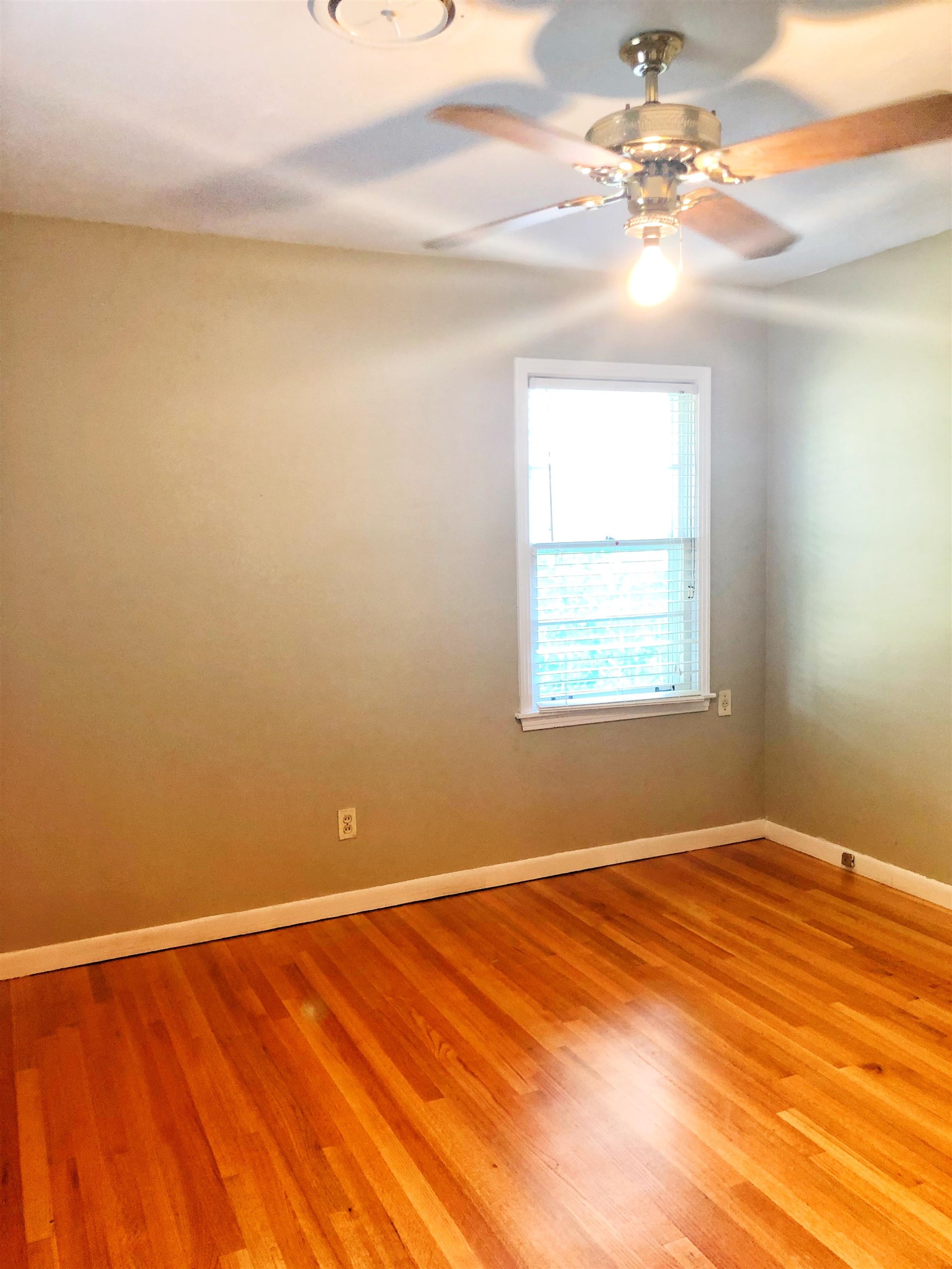 1629 Rabb Road Memphis, TN 38119 - Photo 11 of 21 a view of an empty room with a window