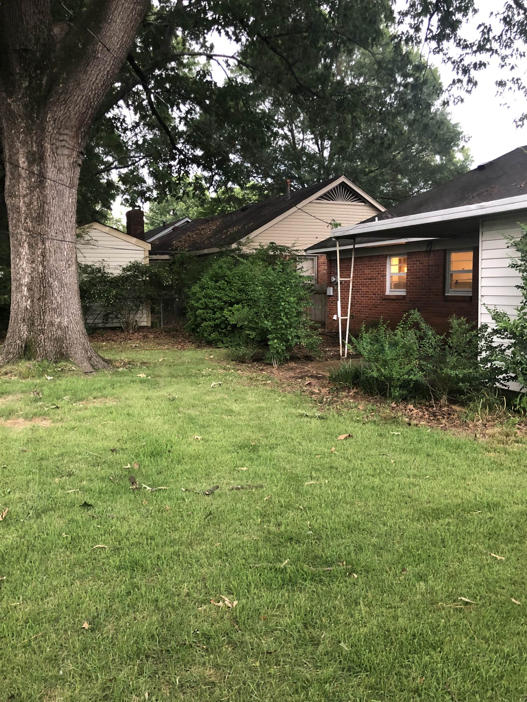 1629 Rabb Road Memphis, TN 38119 - Photo 21 of 21 a view of a house with a yard