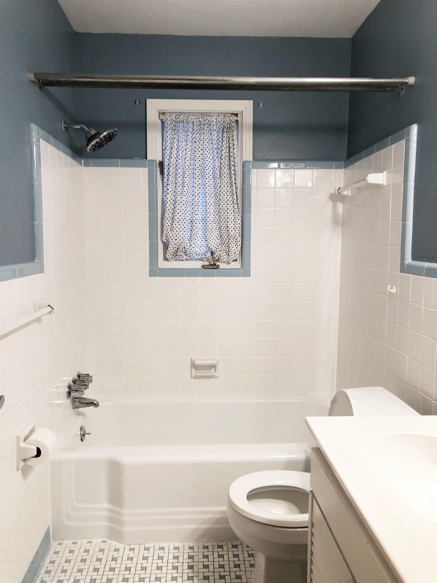 1629 Rabb Road Memphis, TN 38119 - Photo 8 of 21 a bathroom with a bathtub shower sink vanity and toilet