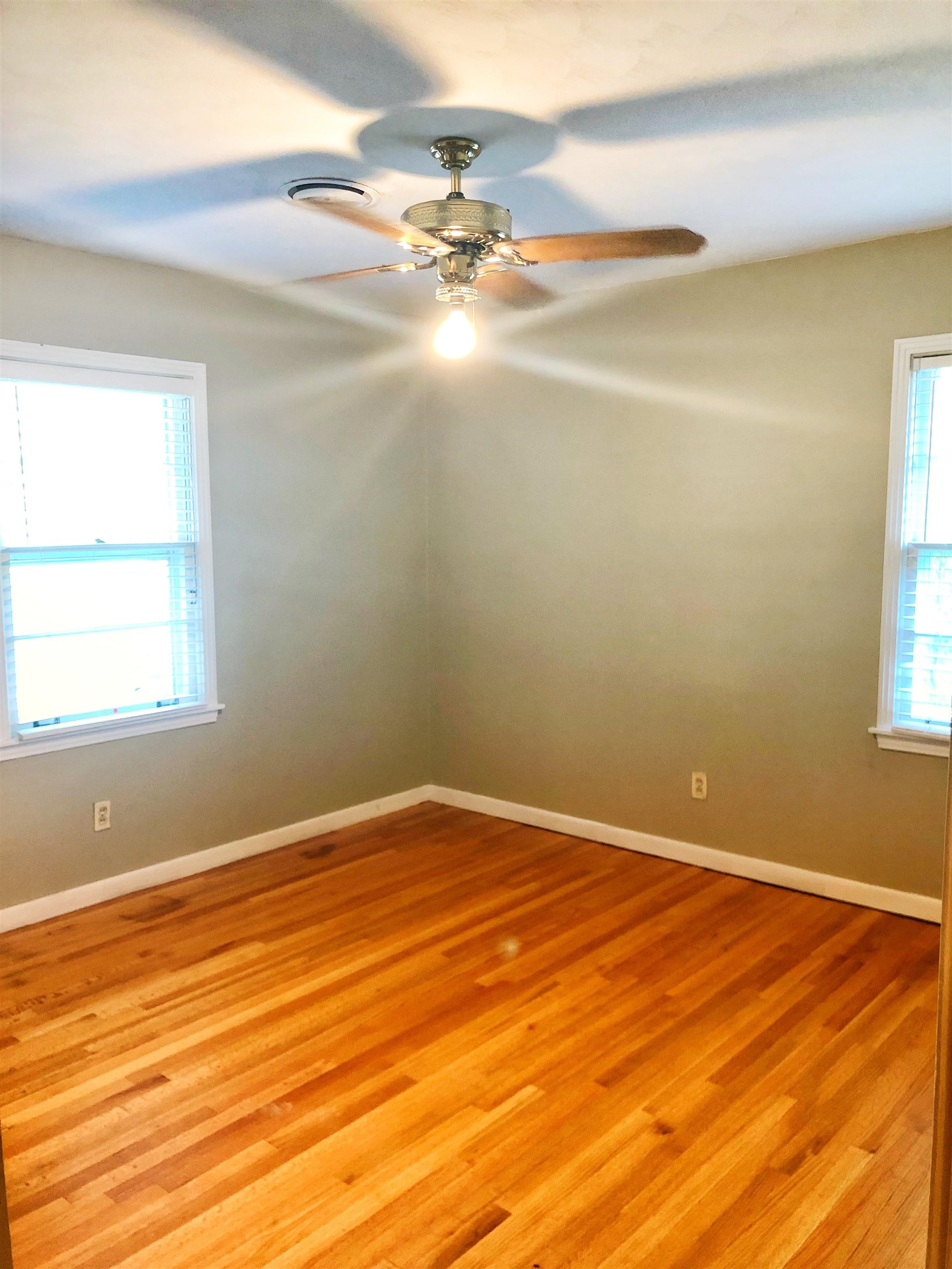 1629 Rabb Road Memphis, TN 38119 - Photo 10 of 21 an empty room with a empty space and a window