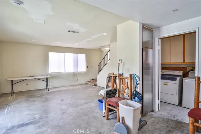 a bathroom with a sink mirror and toilet