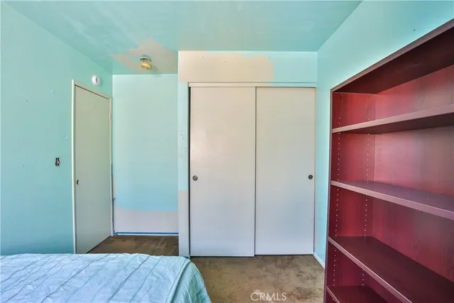 a view of a livingroom with a dresser