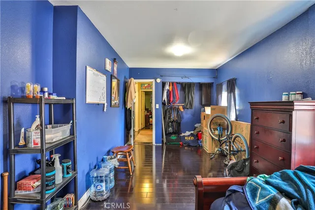 a bathroom with a sink a mirror and shower curtain