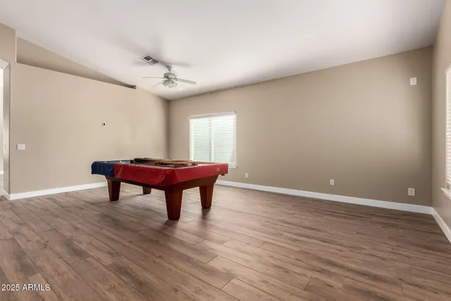 a view of livingroom with hardwood floor and window
