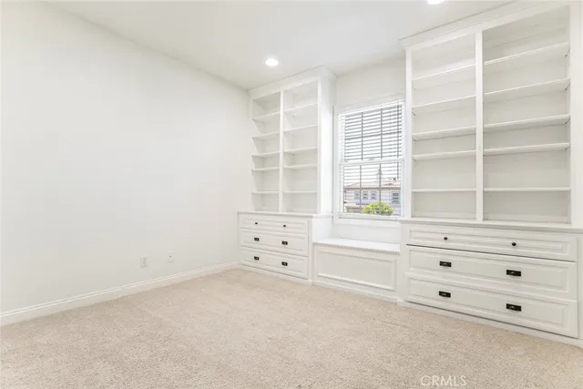 a view of an empty walk in closet