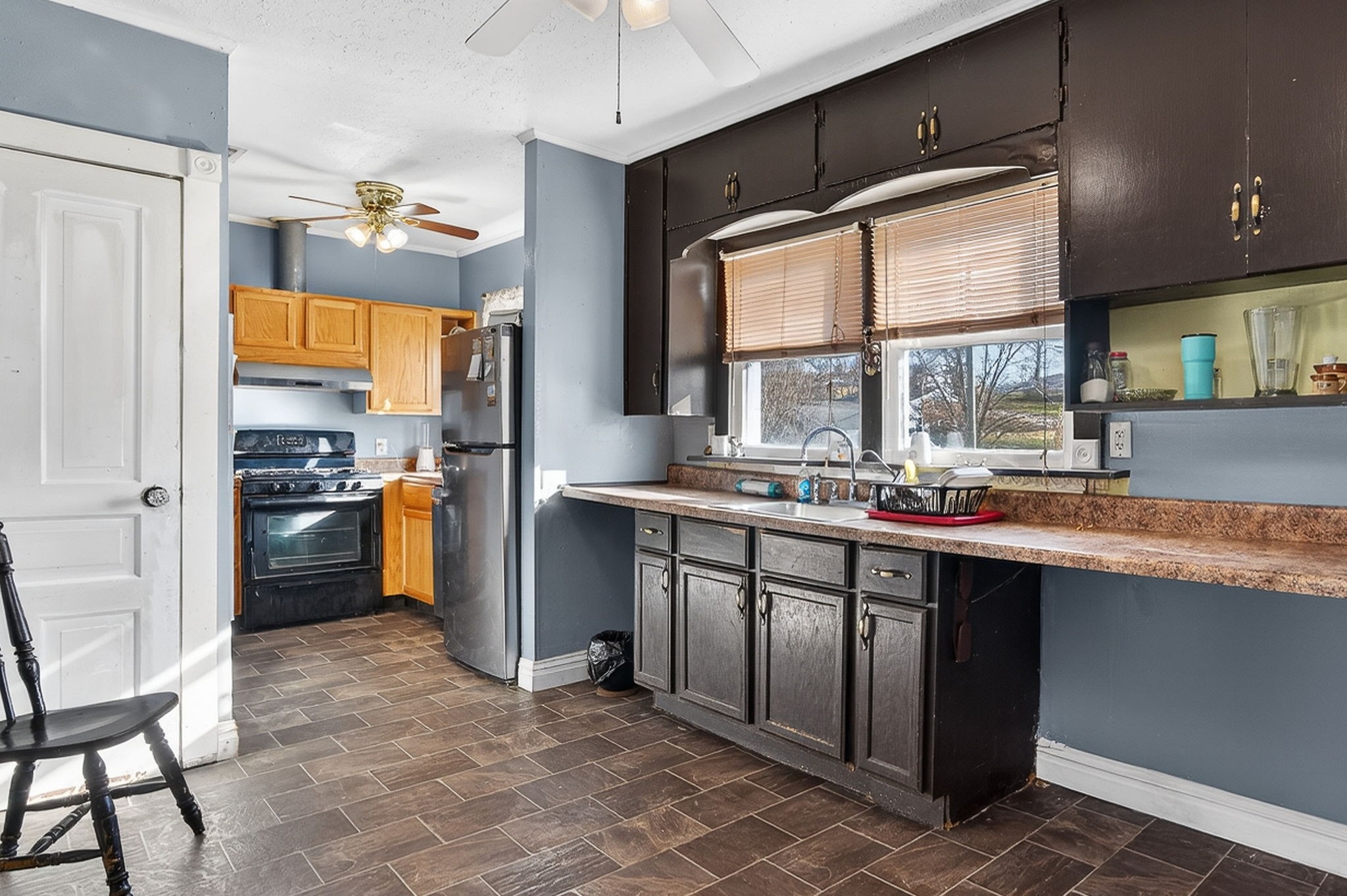 7 Marshall Street Sparta, TN 38583 - Photo 12 of 36 a kitchen with granite countertop a sink stove and refrigerator