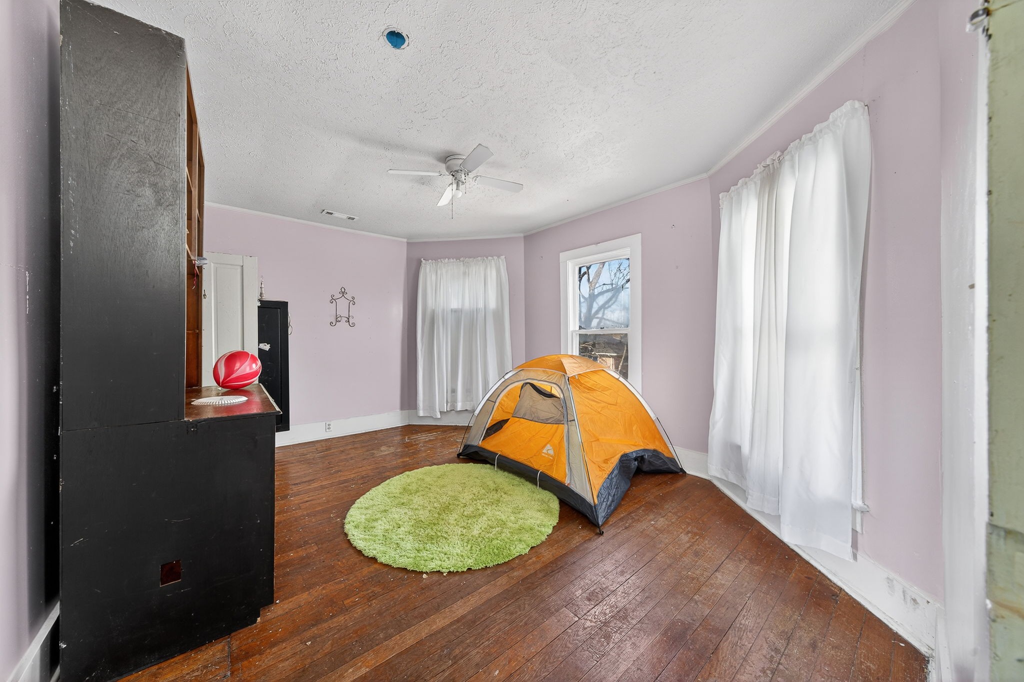 7 Marshall Street Sparta, TN 38583 - Photo 16 of 36 a view of a room with wooden floor and windows
