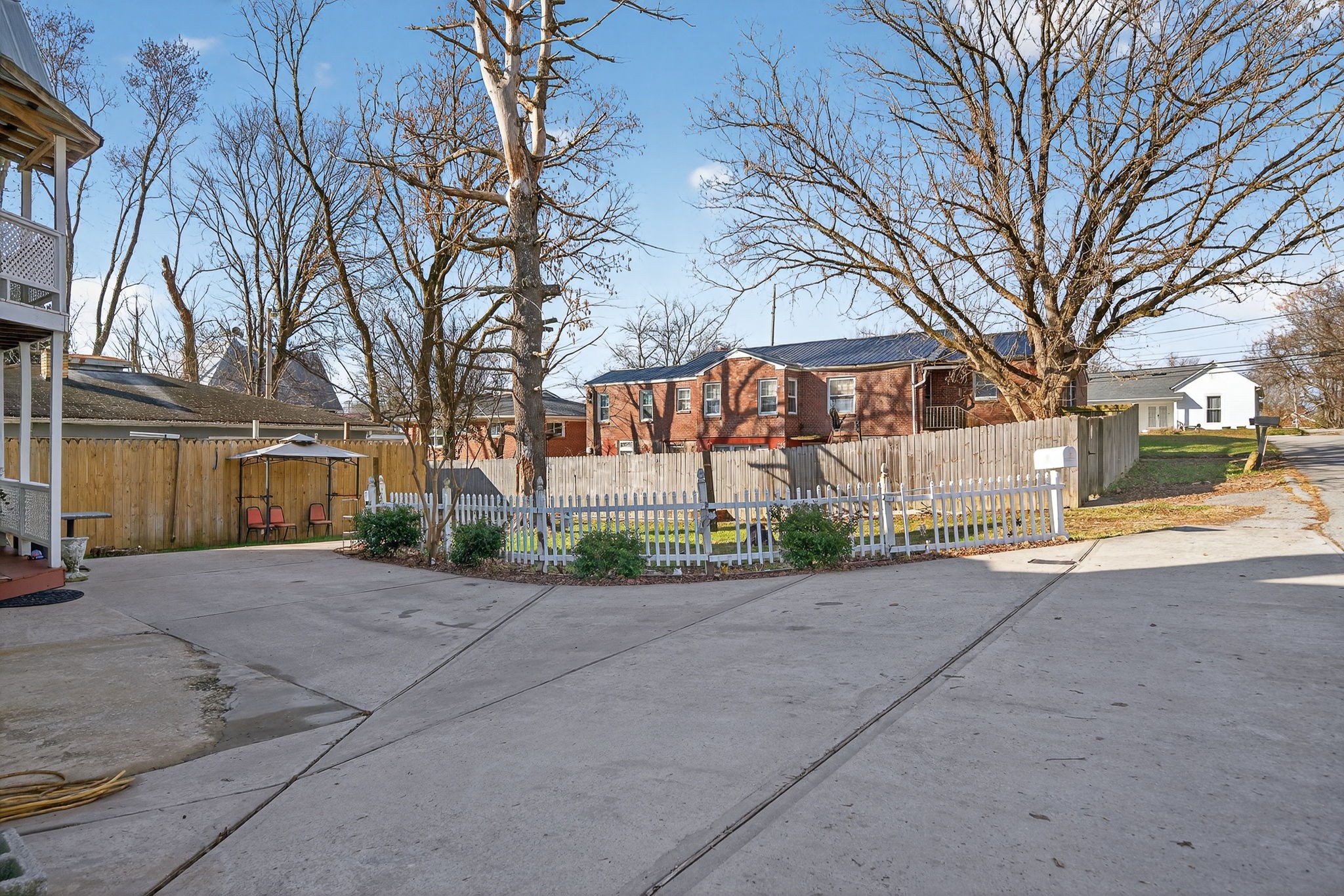 7 Marshall Street Sparta, TN 38583 - Photo 28 of 36 a sidewalk with a building and trees in the background