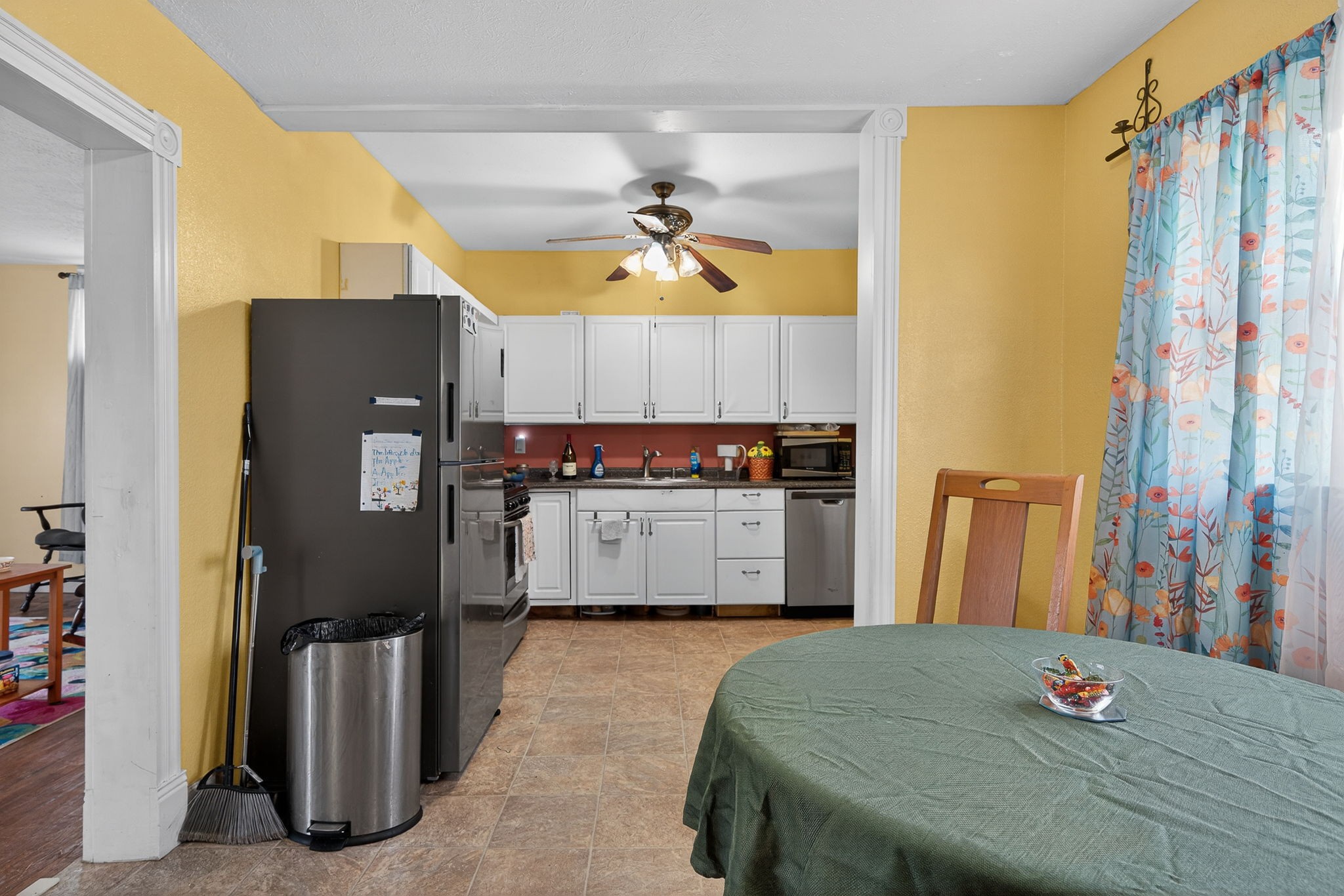 7 Marshall Street Sparta, TN 38583 - Photo 4 of 36 a kitchen that has a lot of cabinets a sink and a refrigerator