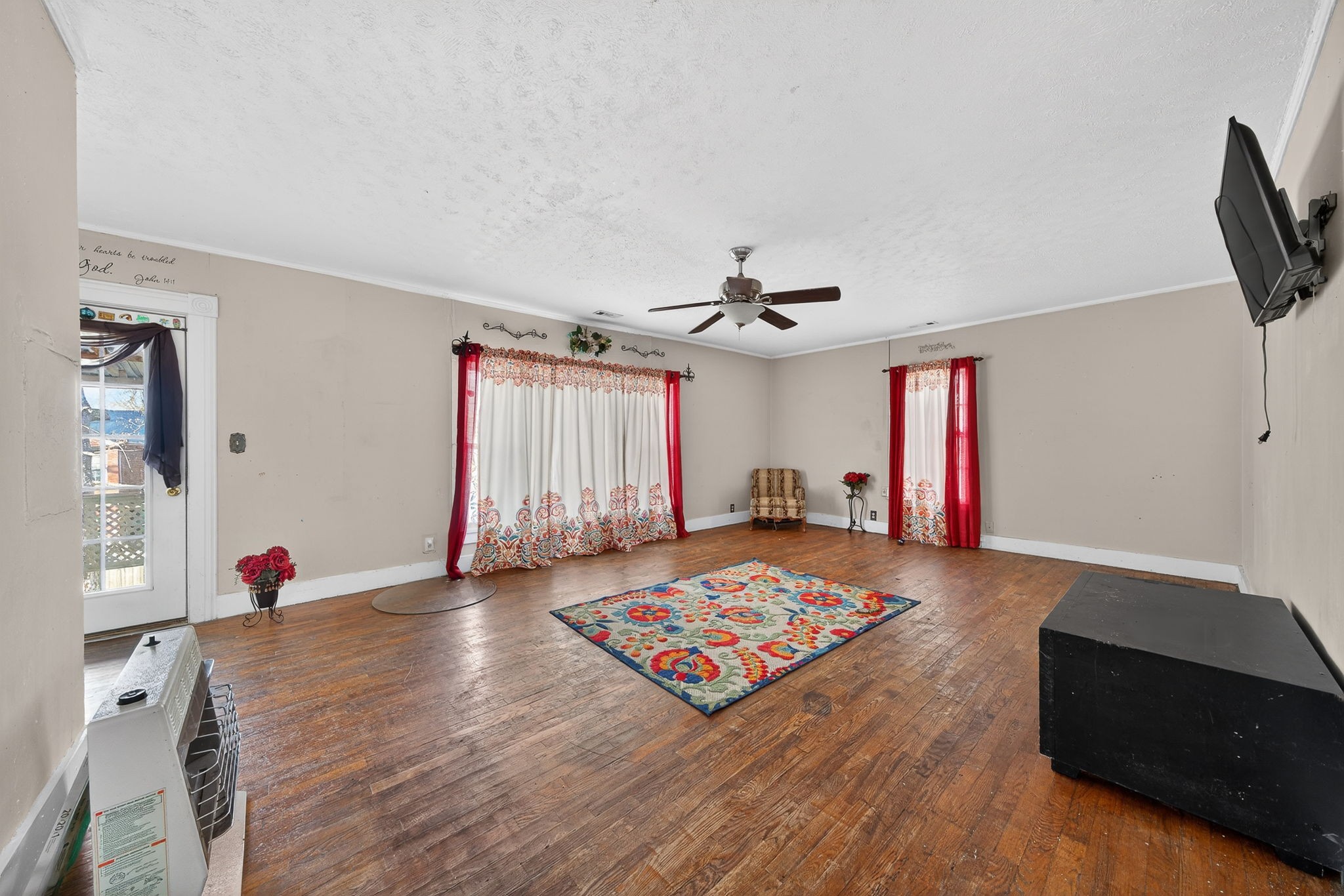 7 Marshall Street Sparta, TN 38583 - Photo 10 of 36 a living room with furniture and a flat screen tv