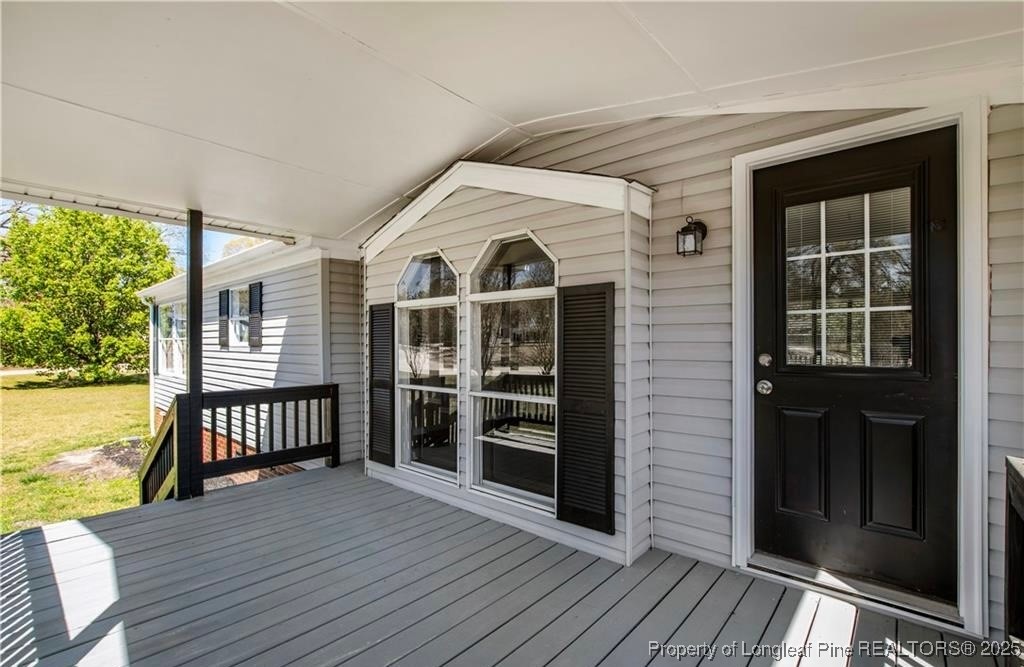 a view of a house with a deck