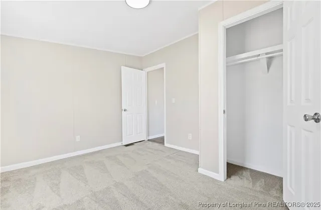 a room with a bed and a closet