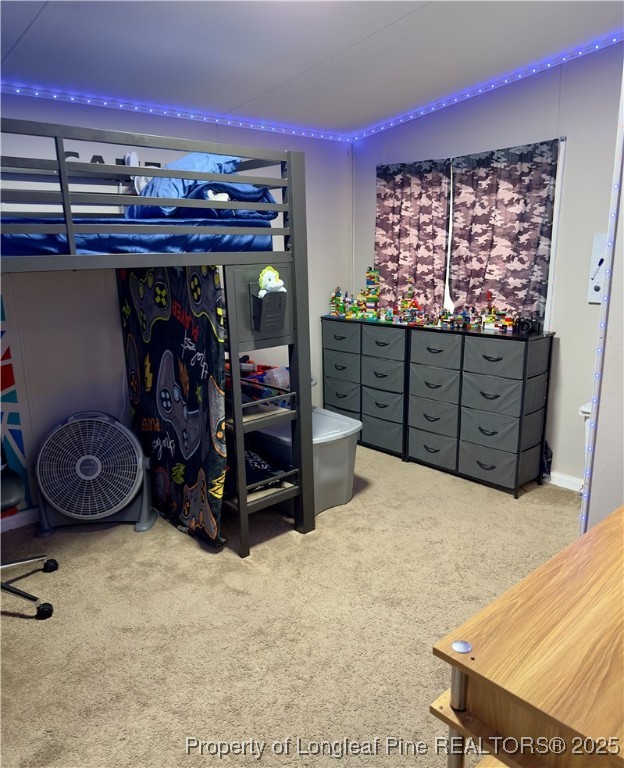 292 Grenada Road Fayetteville, NC 28306 - Photo 23 of 37 a room with a bed and a closet