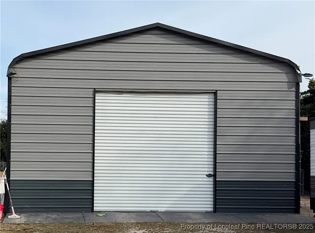 a view of a car parked in front of house