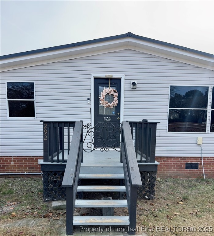 292 Grenada Road Fayetteville, NC 28306 - Photo 37 of 37 a front view of a house with entryway