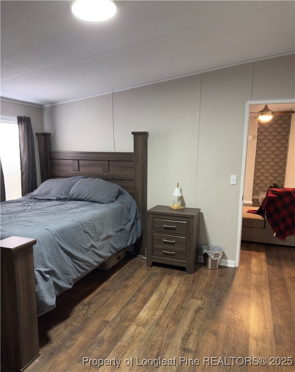 292 Grenada Road Fayetteville, NC 28306 - Photo 10 of 37 a bedroom with a bed and a dresser