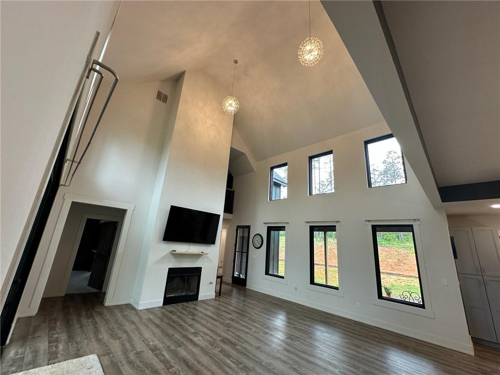 1001 Bailey Road Rome, GA 30161 - Photo 6 of 44 a view of a livingroom with an empty space and a fireplace