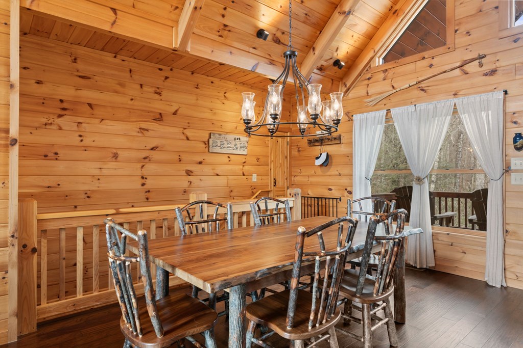 197 Cashes Valley Cherry Log, GA 30522 - Photo 14 of 67 a view of a balcony with furniture and wooden floor