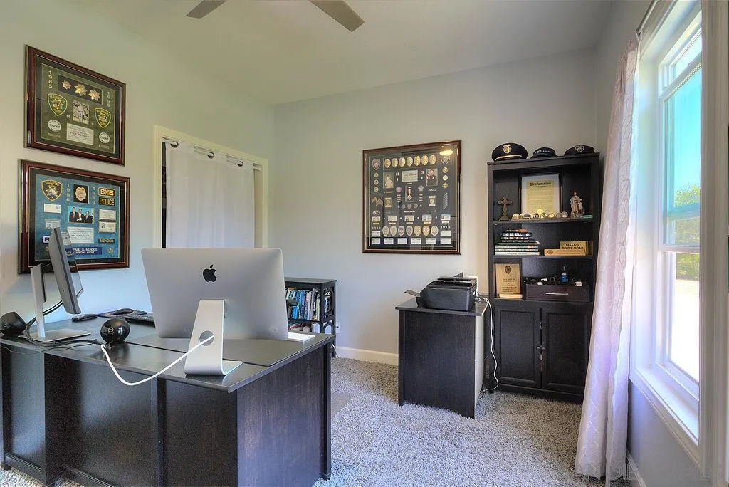 1450 Ridgeway Street Oceanside, CA 92054 - Photo 18 of 41 a view of a workspace with furniture and window