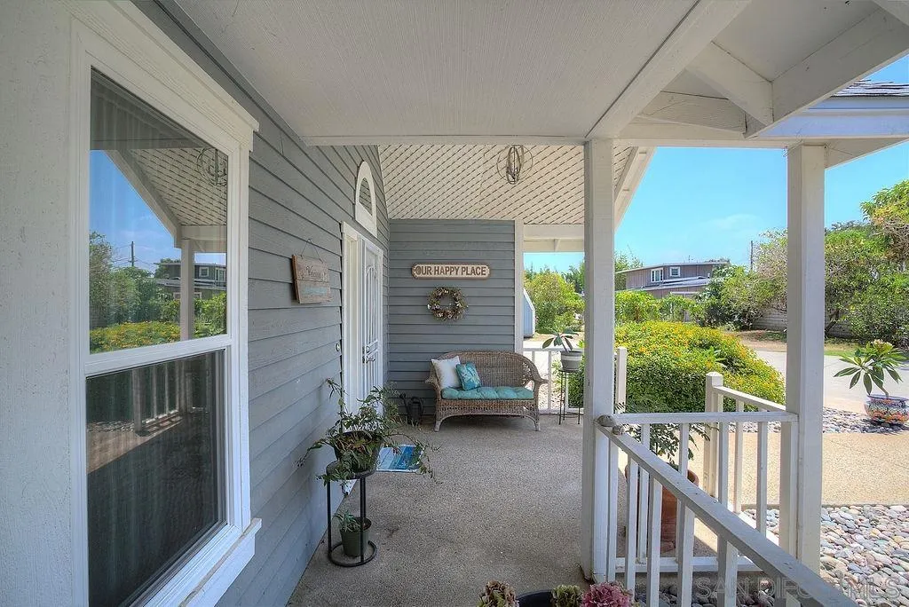 1450 Ridgeway Street Oceanside, CA 92054 - Photo 2 of 41 a living room with furniture and a window