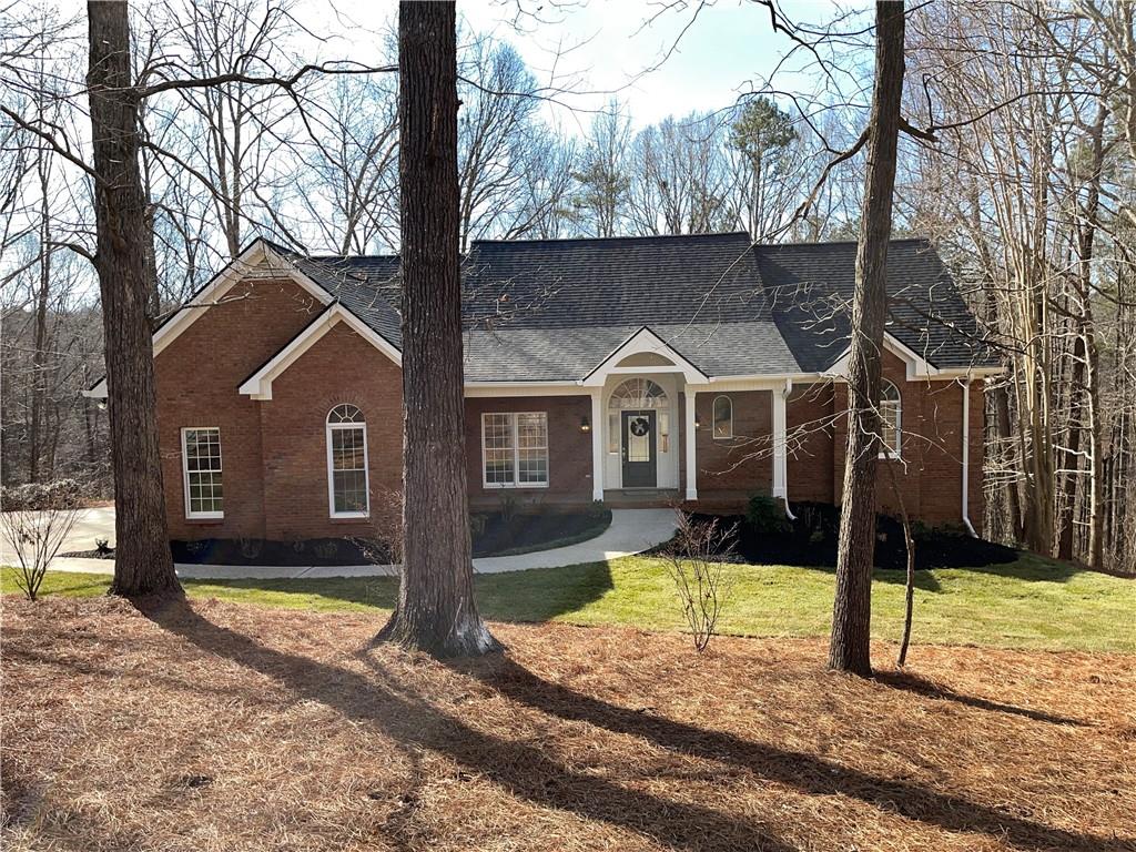 200 Rose Ridge Drive Canton, GA 30115 - Photo 1 of 1 a front view of a house with a yard
