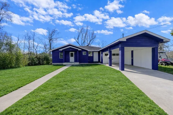 a view of a house with a big yard