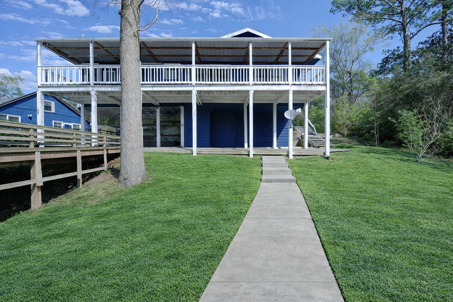 232 Hideaway Lane Goodrich, TX 77335 - Photo 30 of 34 front view of a building with a yard