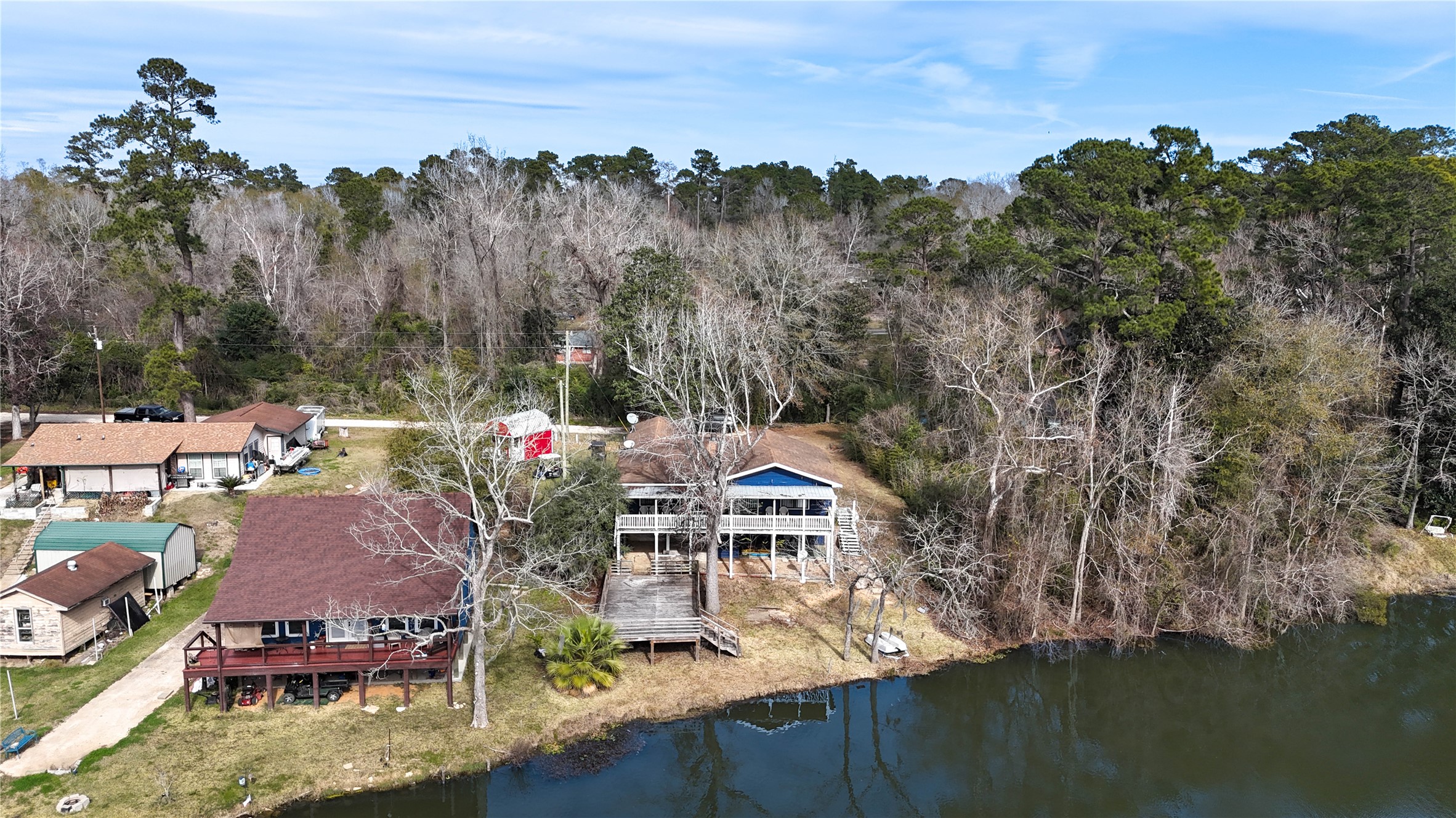 232 Hideaway Lane Goodrich, TX 77335 - Photo 32 of 34 a view of a lake with houses