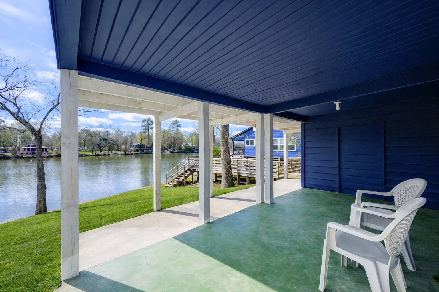 232 Hideaway Lane Goodrich, TX 77335 - Photo 4 of 34 Additional covered area for storage or lounging