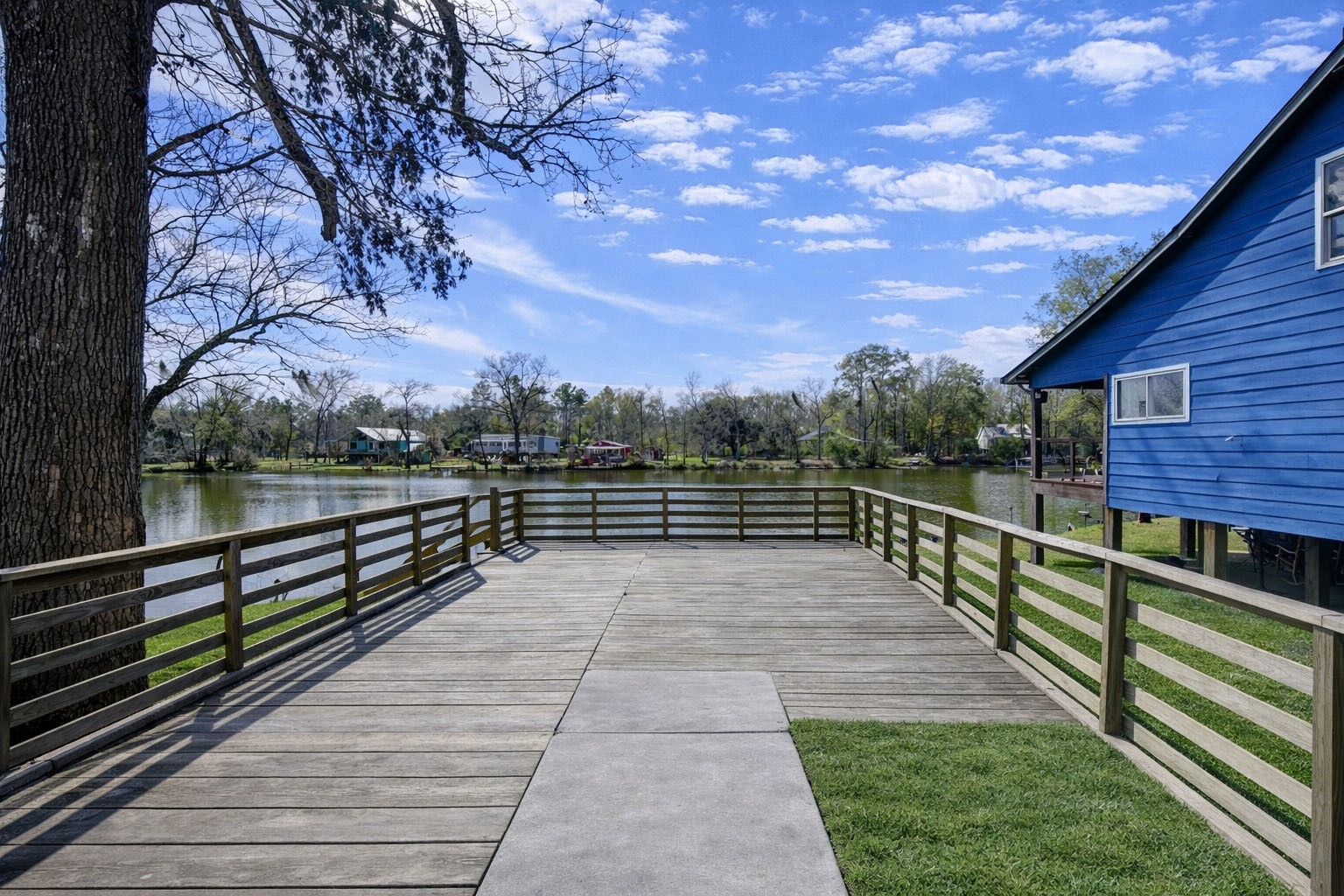 232 Hideaway Lane Goodrich, TX 77335 - Photo 5 of 34 Beautiful deck over looking the lake