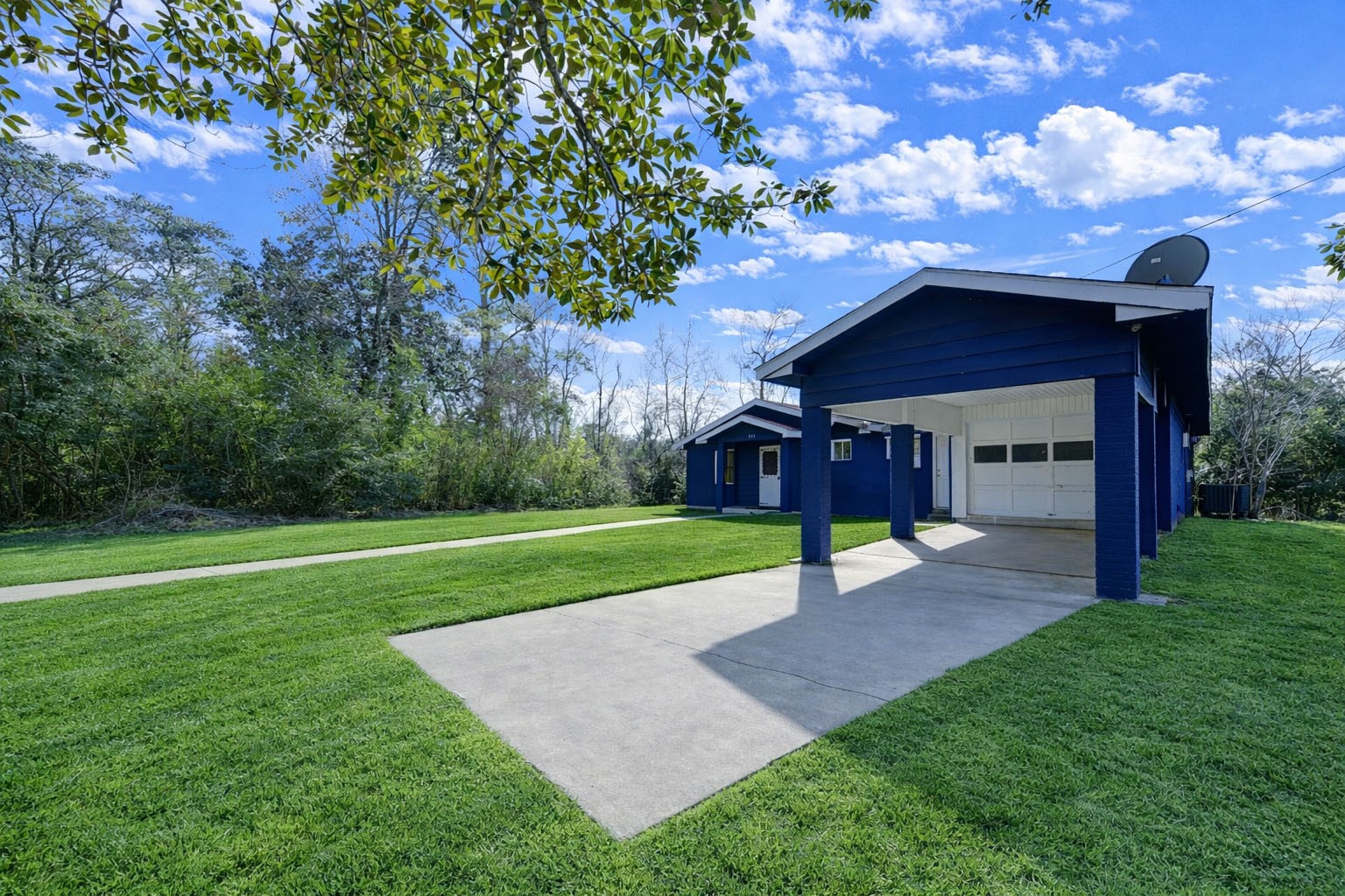 232 Hideaway Lane Goodrich, TX 77335 - Photo 7 of 34 a view of a house with a yard