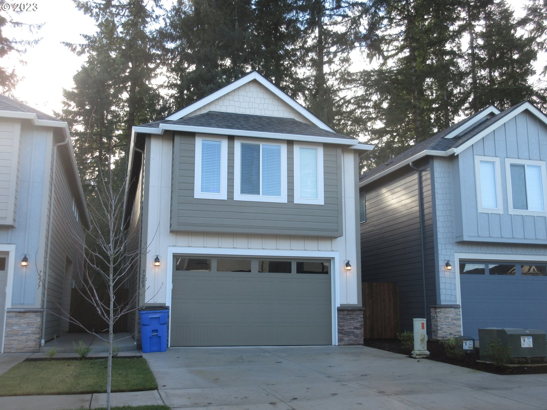 7209 South 13th Street Ridgefield, WA 98642 - Photo 1 of 7 a front view of a house with a yard
