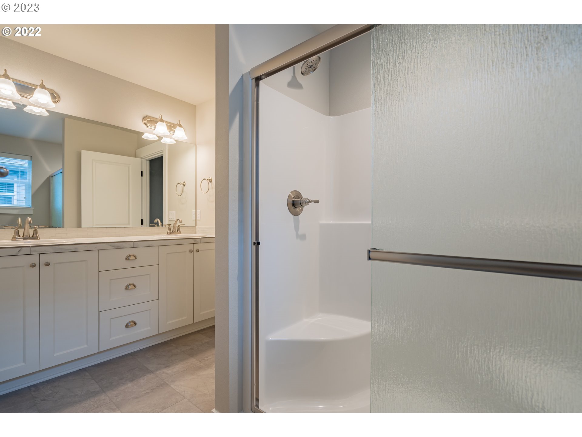 7209 South 13th Street Ridgefield, WA 98642 - Photo 6 of 7 a bathroom with a shower and a sink