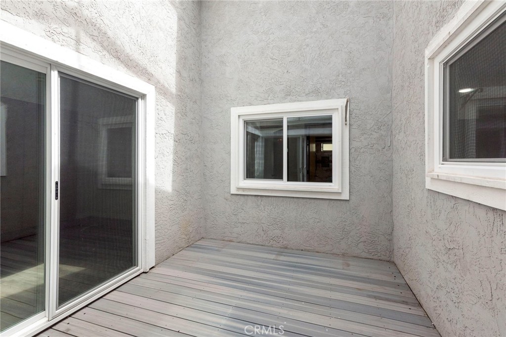1901 Laurel Road Oceanside, CA 92054 - Photo 16 of 54 Atrium between living room, hallway and one of the bedrooms