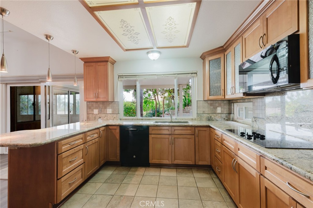 1901 Laurel Road Oceanside, CA 92054 - Photo 18 of 54 Kitchen with granite counteropsand updated cabinets