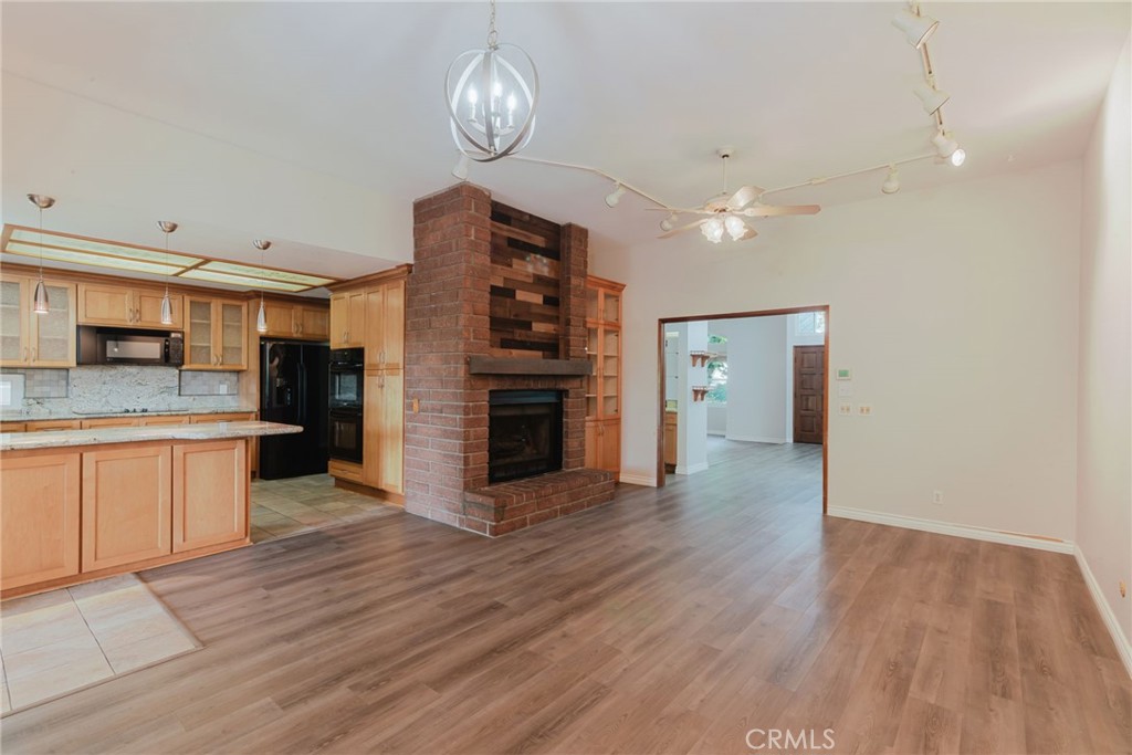 1901 Laurel Road Oceanside, CA 92054 - Photo 21 of 54 Kitchen open to the family room with fireplace