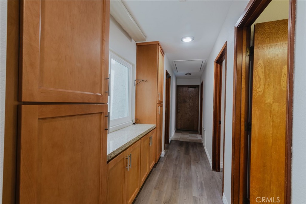 1901 Laurel Road Oceanside, CA 92054 - Photo 32 of 54 Hallway looking out from primary bedroom to other 3 bedrooms