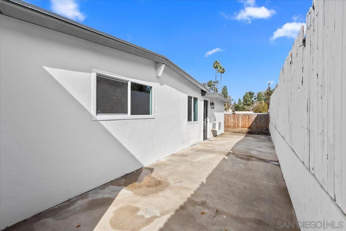 9255 Fairlawn Street Santee, CA 92071 - Photo 20 of 34 a view of a house with backyard