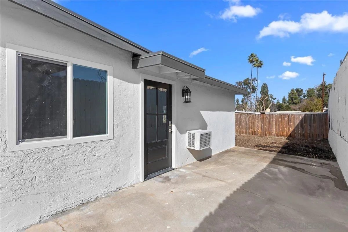 9255 Fairlawn Street Santee, CA 92071 - Photo 21 of 34 a view of a house with a yard
