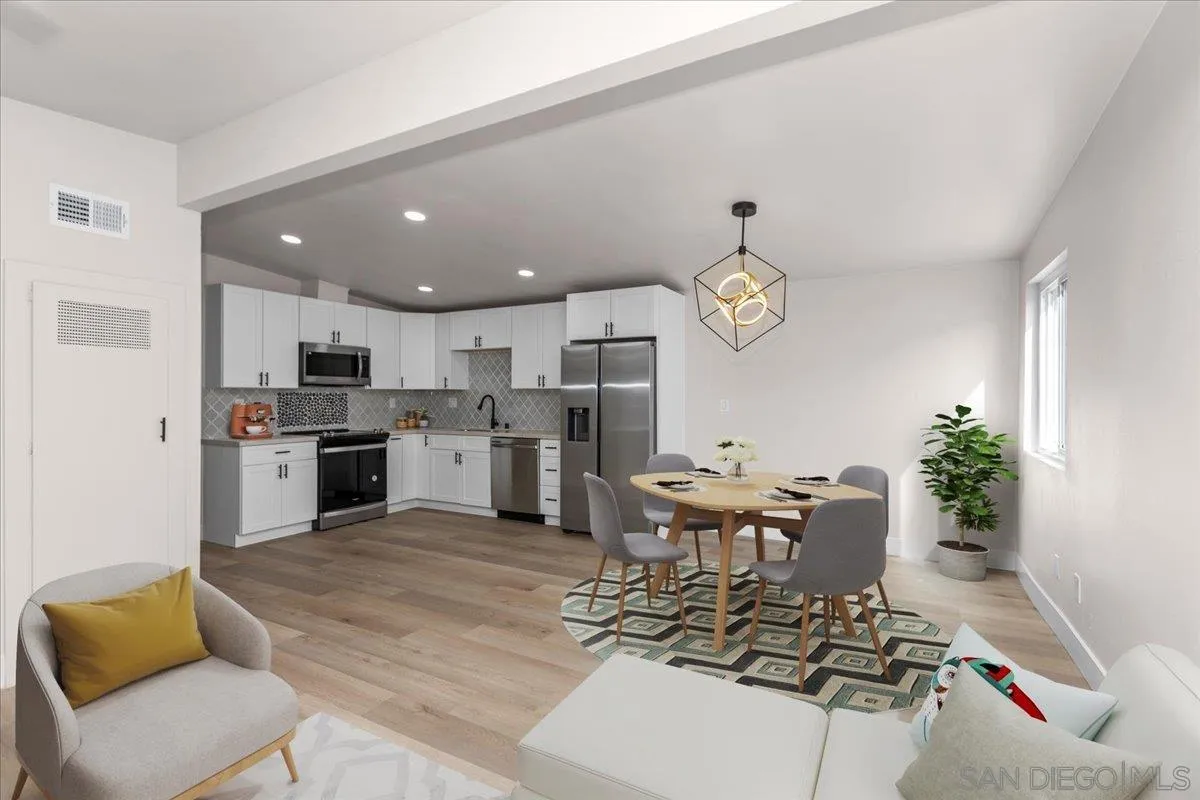 9255 Fairlawn Street Santee, CA 92071 - Photo 6 of 34 a living room with furniture and a dining table with kitchen view