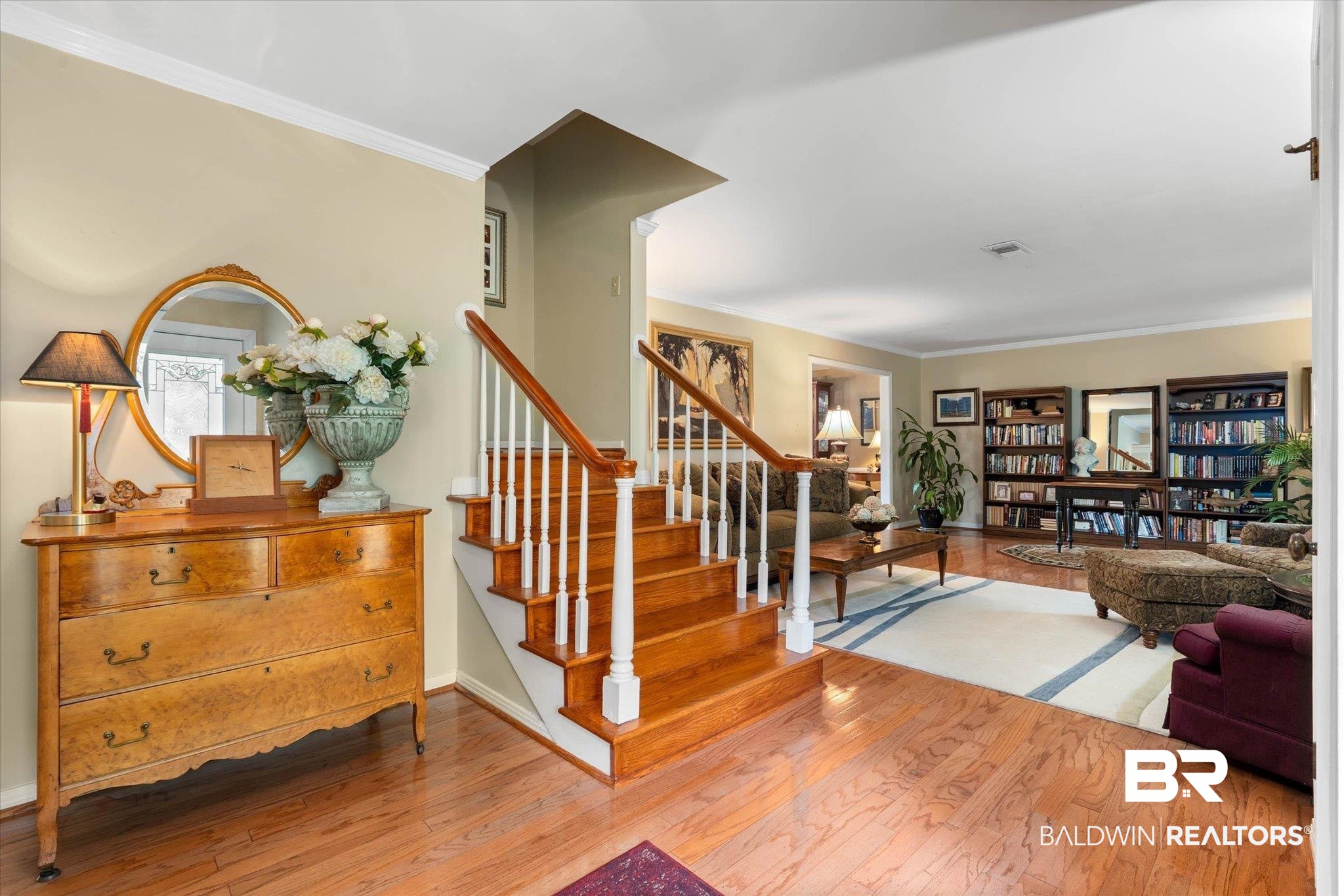 559 East Cumberland Road Mobile, AL 36608 - Photo 2 of 48 Stairs featuring hardwood / wood-style flooring and crown molding
