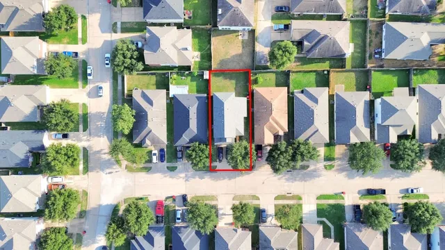 an outdoor space with lots of potted plants