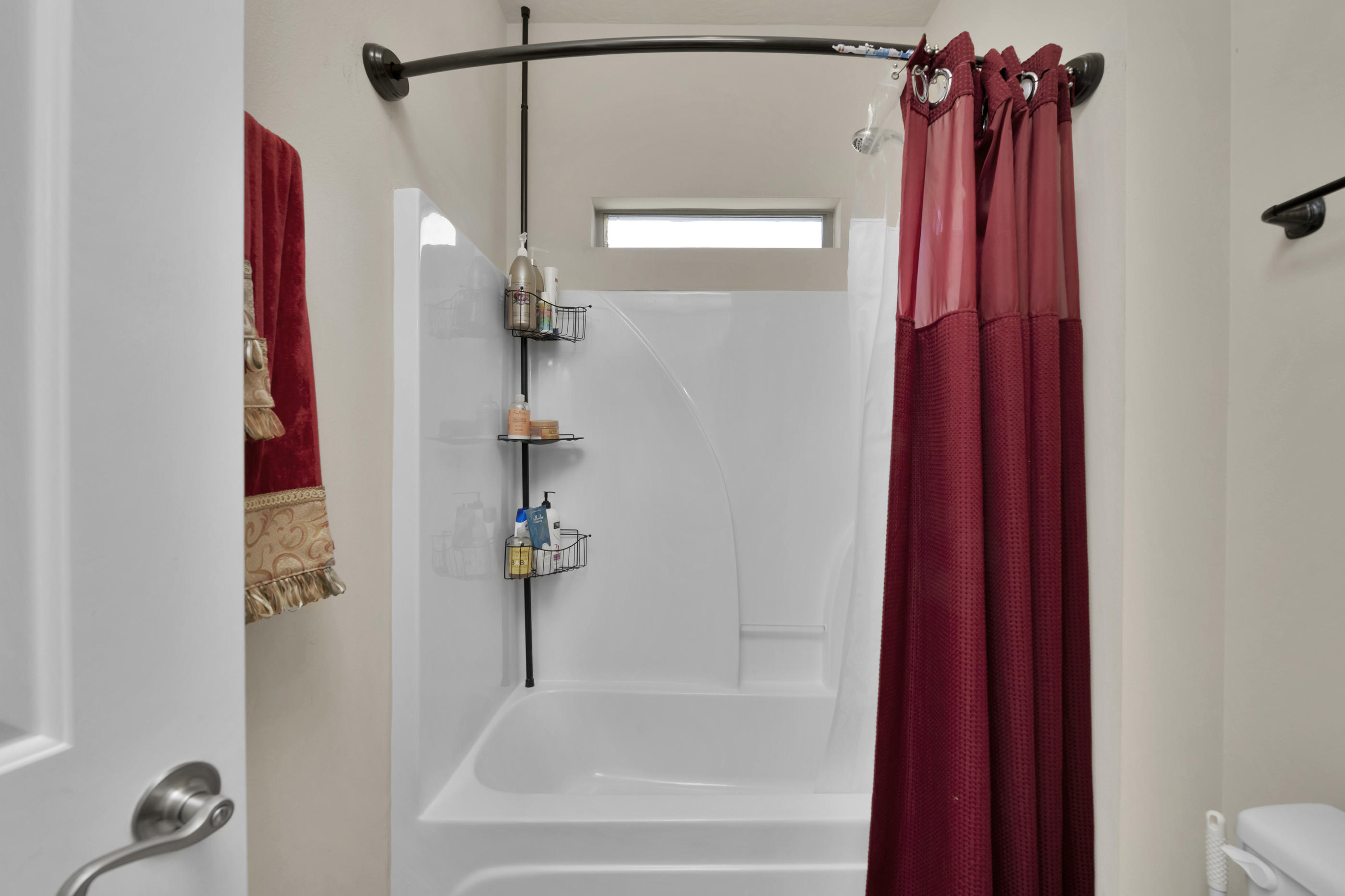 4608 Hermosa Road Crestview, FL 32539 - Photo 19 of 26 a bathroom with a shower and a tub