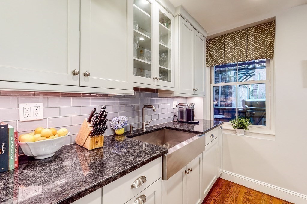 476 Shawmut Avenue, Unit 3 Boston, MA 02118 - Photo 13 of 29 a kitchen with a sink and cabinets