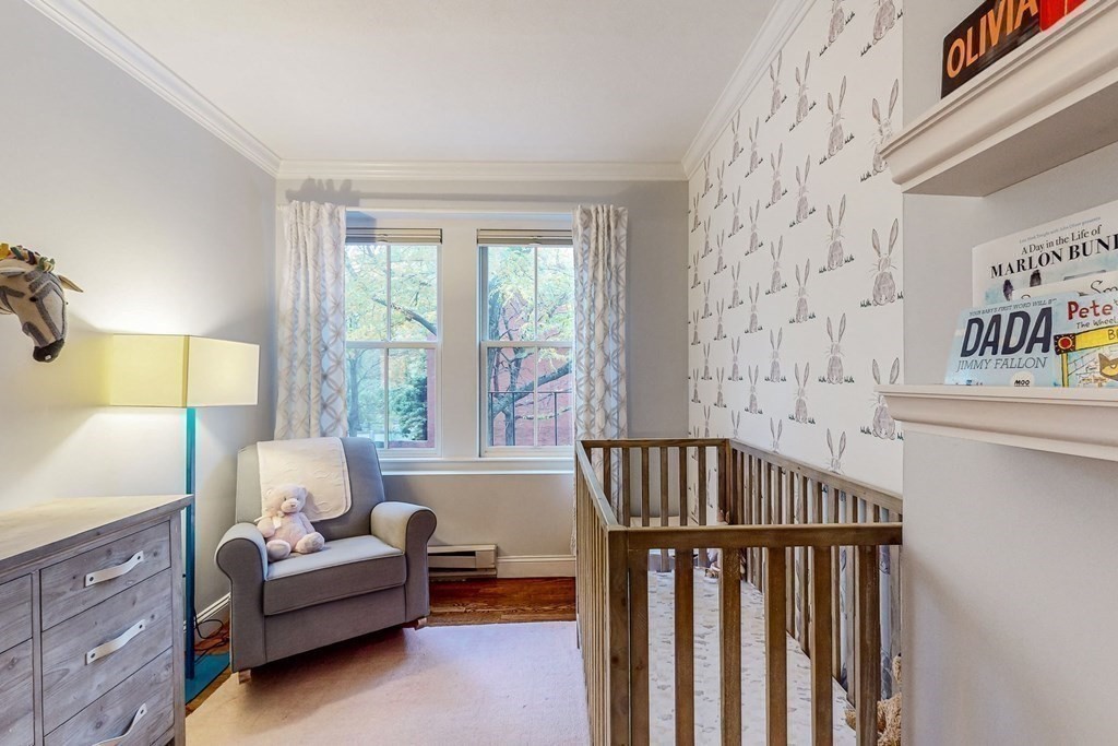 476 Shawmut Avenue, Unit 3 Boston, MA 02118 - Photo 20 of 29 a bedroom with furniture and a window