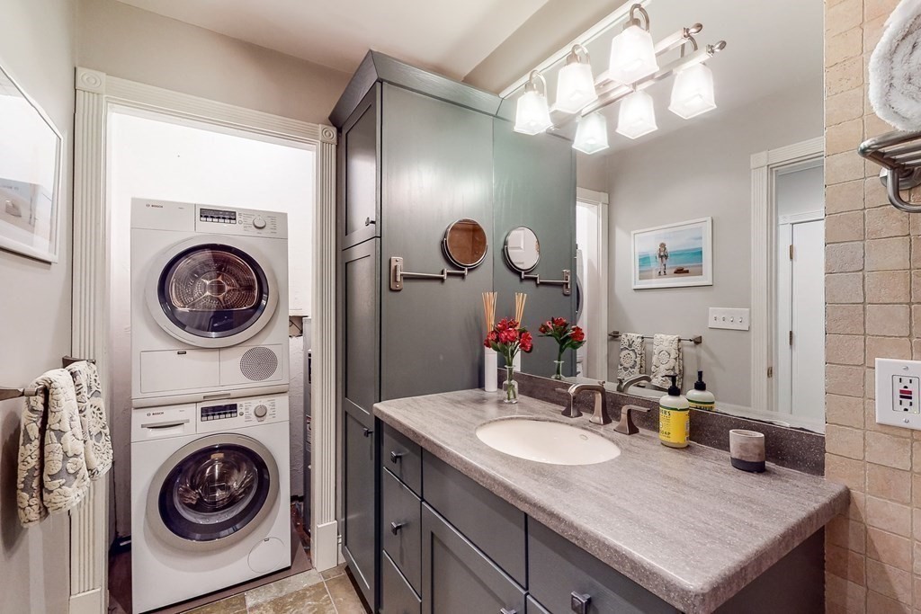 476 Shawmut Avenue, Unit 3 Boston, MA 02118 - Photo 26 of 29 a bathroom with a sink a vanity and a mirror