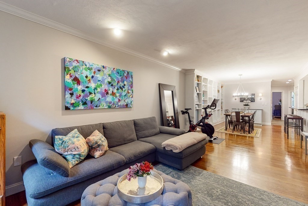 476 Shawmut Avenue, Unit 3 Boston, MA 02118 - Photo 3 of 29 a living room with furniture and painting on the wall