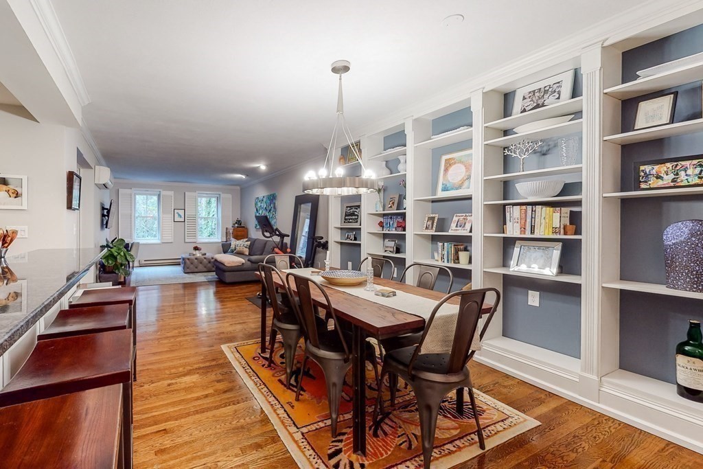 476 Shawmut Avenue, Unit 3 Boston, MA 02118 - Photo 6 of 29 a view of a dining room with furniture and wooden floor