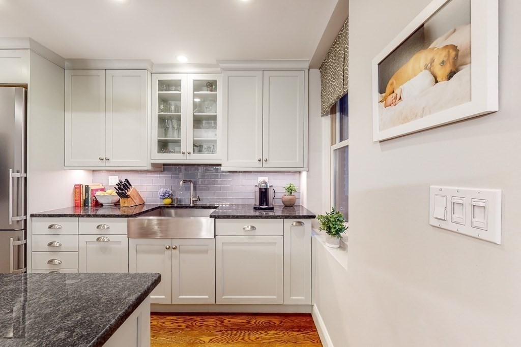 476 Shawmut Avenue, Unit 3 Boston, MA 02118 - Photo 10 of 29 a kitchen with stainless steel appliances granite countertop a stove a sink and a microwave