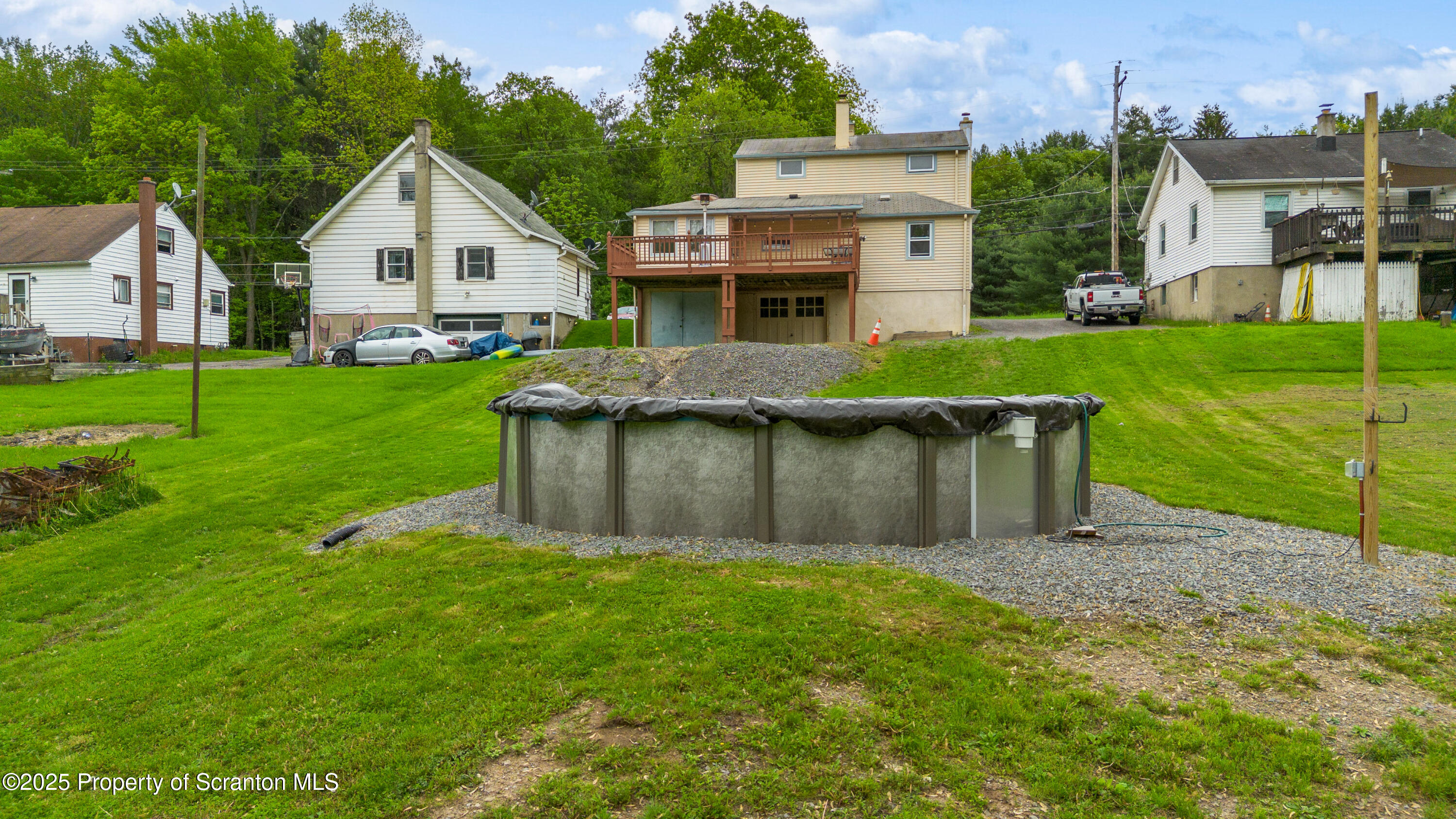 730 Chase Road Shavertown, PA 18708 - Photo 11 of 43 a view of a house with a yard and sitting area